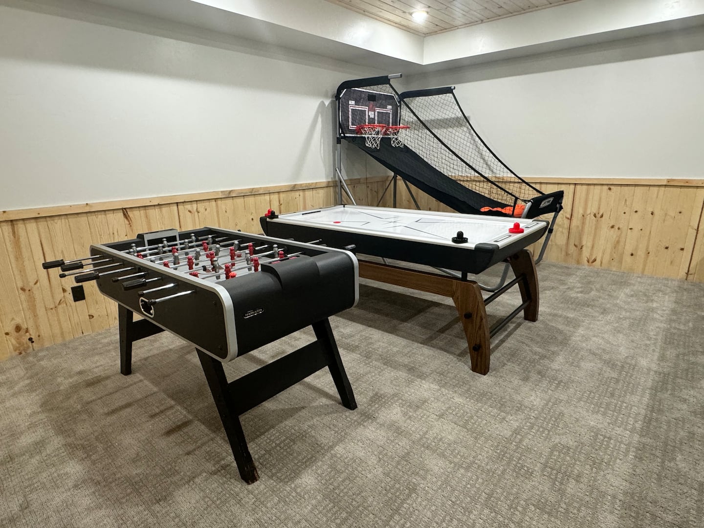 Game room with foosball and air hockey